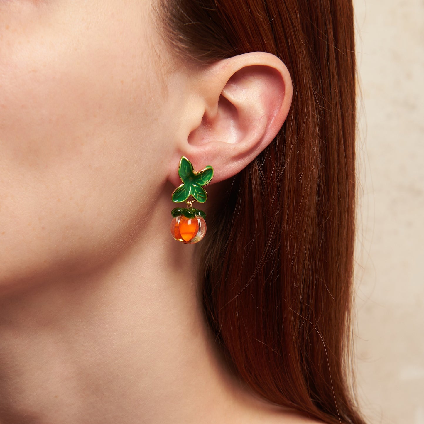 Fruity charm meets cottagecore whimsy in these hand-crafted enamel earrings. Each one a tiny ode to summer orchards and artisan magic.
