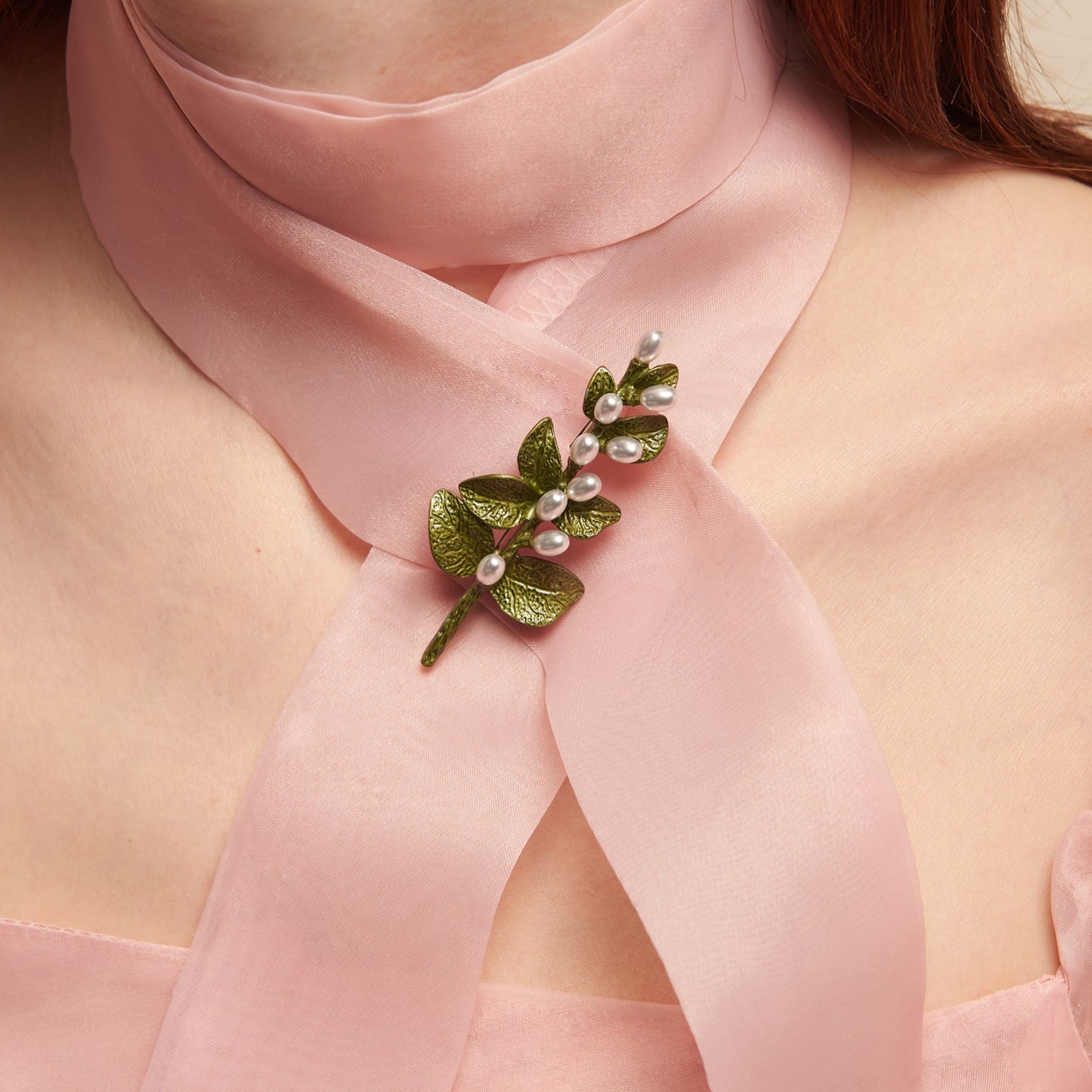 Vintage-style brooch shaped like a blooming branch, with floral details and rustic finish—perfect cottagecore accessory for jackets, dresses, or cardigans.