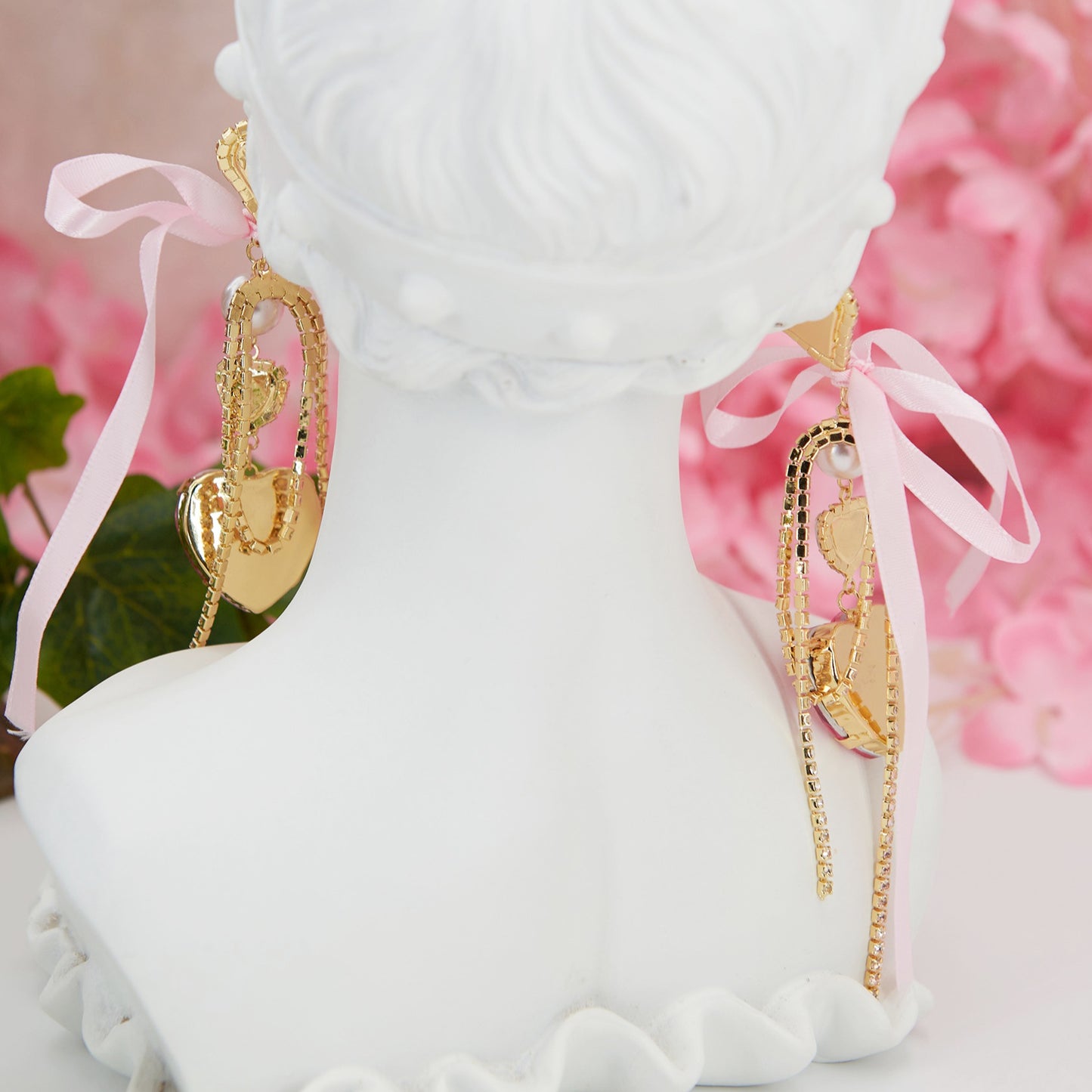 Mina earrings: Barbiecore glam with heart rhinestones, pearl detail, and zircon chains. Perfect for bold Y2K party looks.