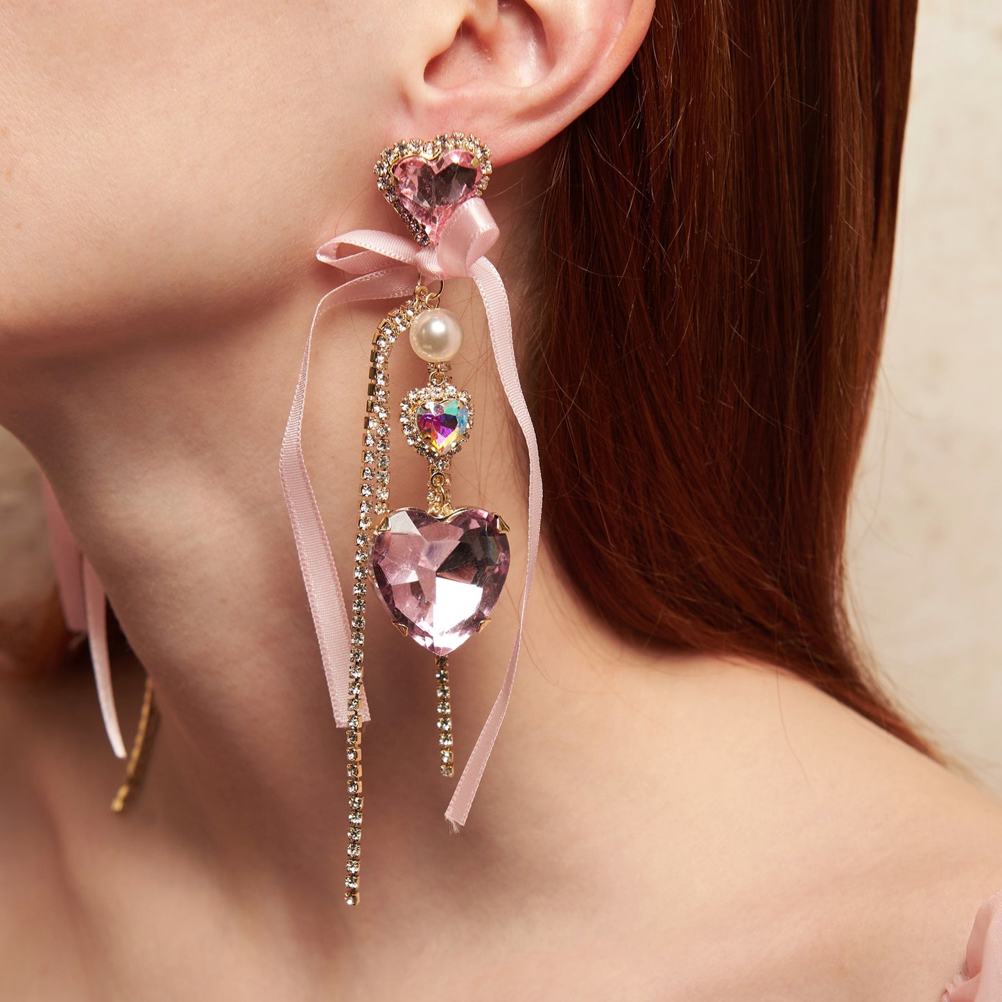 Mina earrings: Barbiecore glam with heart rhinestones, pearl detail, and zircon chains. Perfect for bold Y2K party looks.