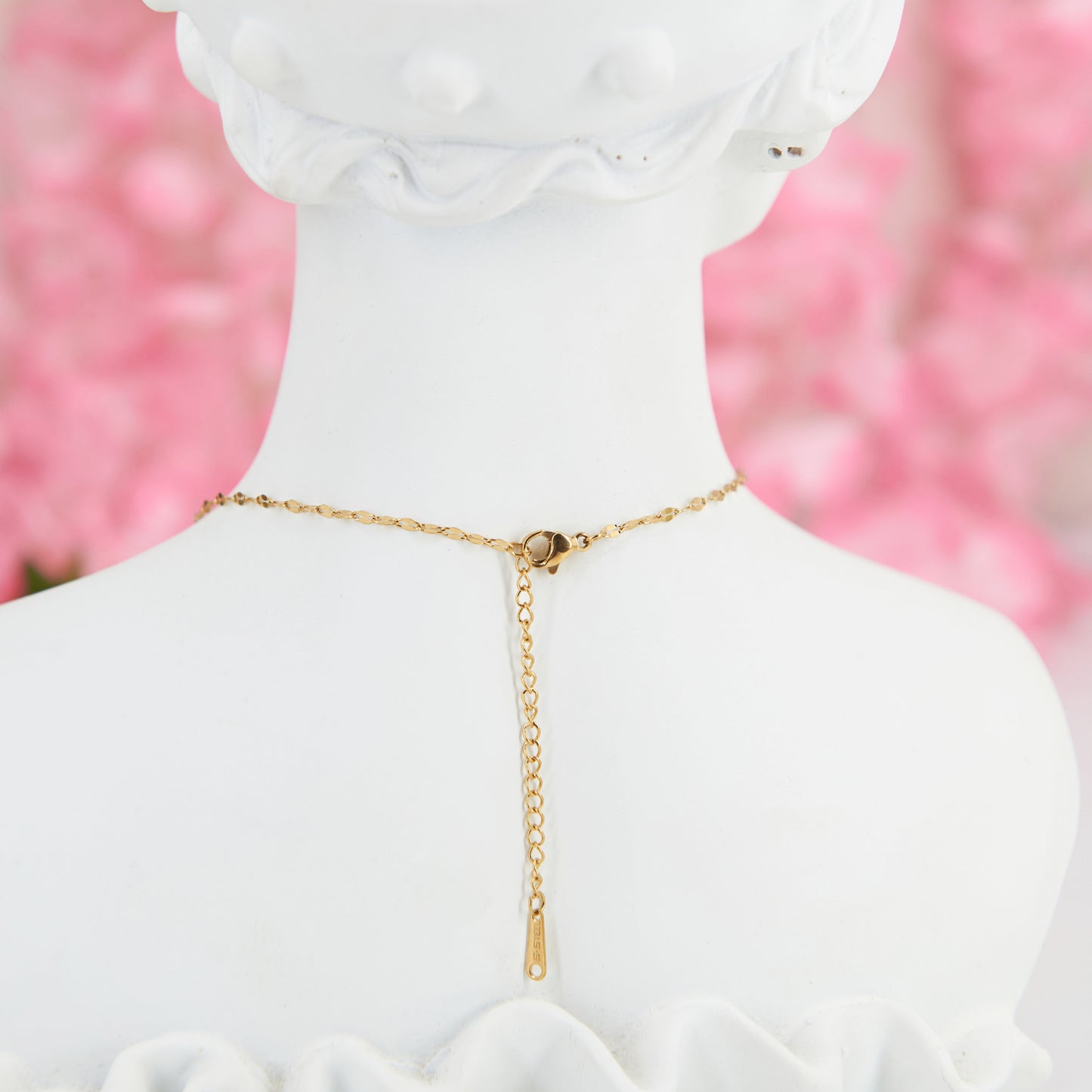 Adjustable stainless steel necklace with a winged heart pendant & white zircon stones. Inspired by Hermès, this elegant piece embodies timeless romance & sustainability.