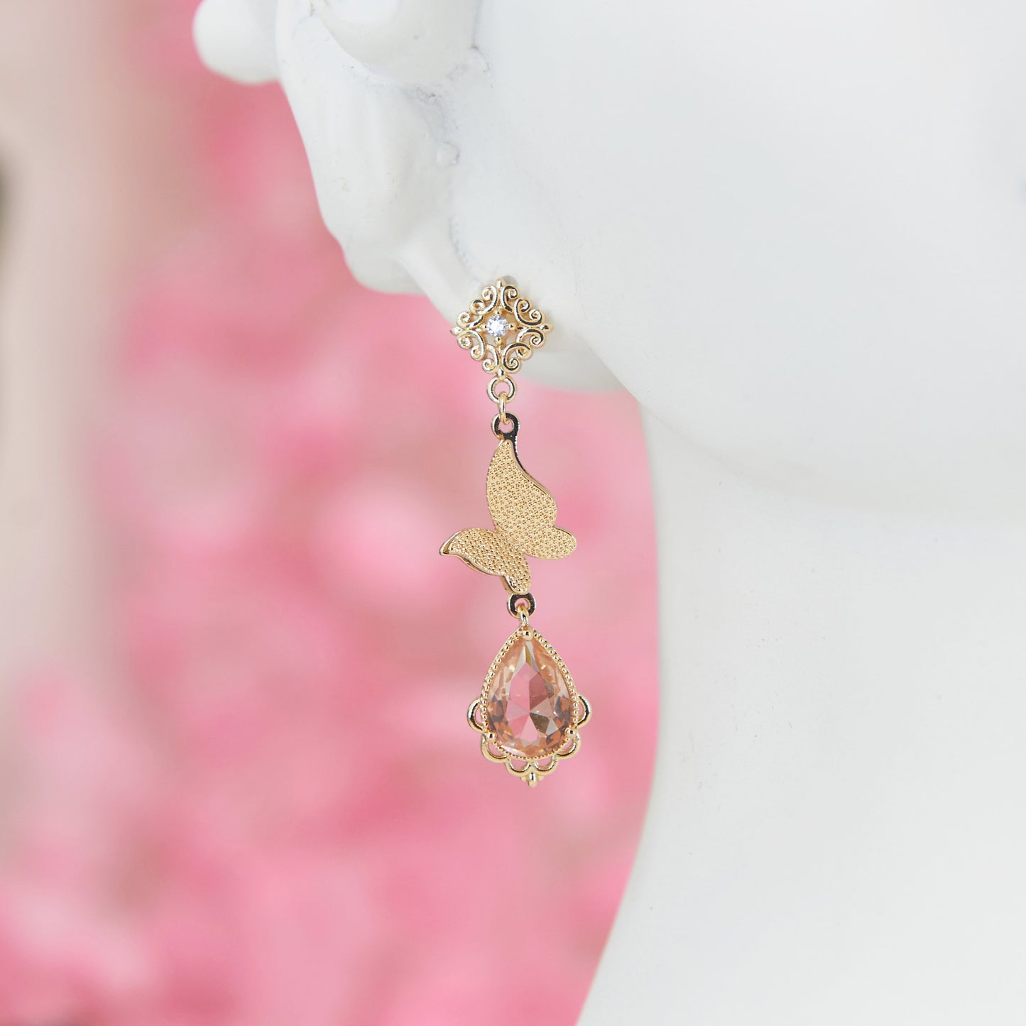 "Persephone" earrings: Asymmetrical dangles with butterflies and coral zircons. 7 cm of spring charm, cottagecore elegance in every detail.