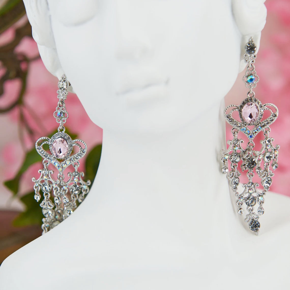 Maxi chandelier earrings, 10 cm. Silver metal with white & pale pink zircons. Baroque design with a large pink zircon centerpiece. Ideal for elegant events or weddings.