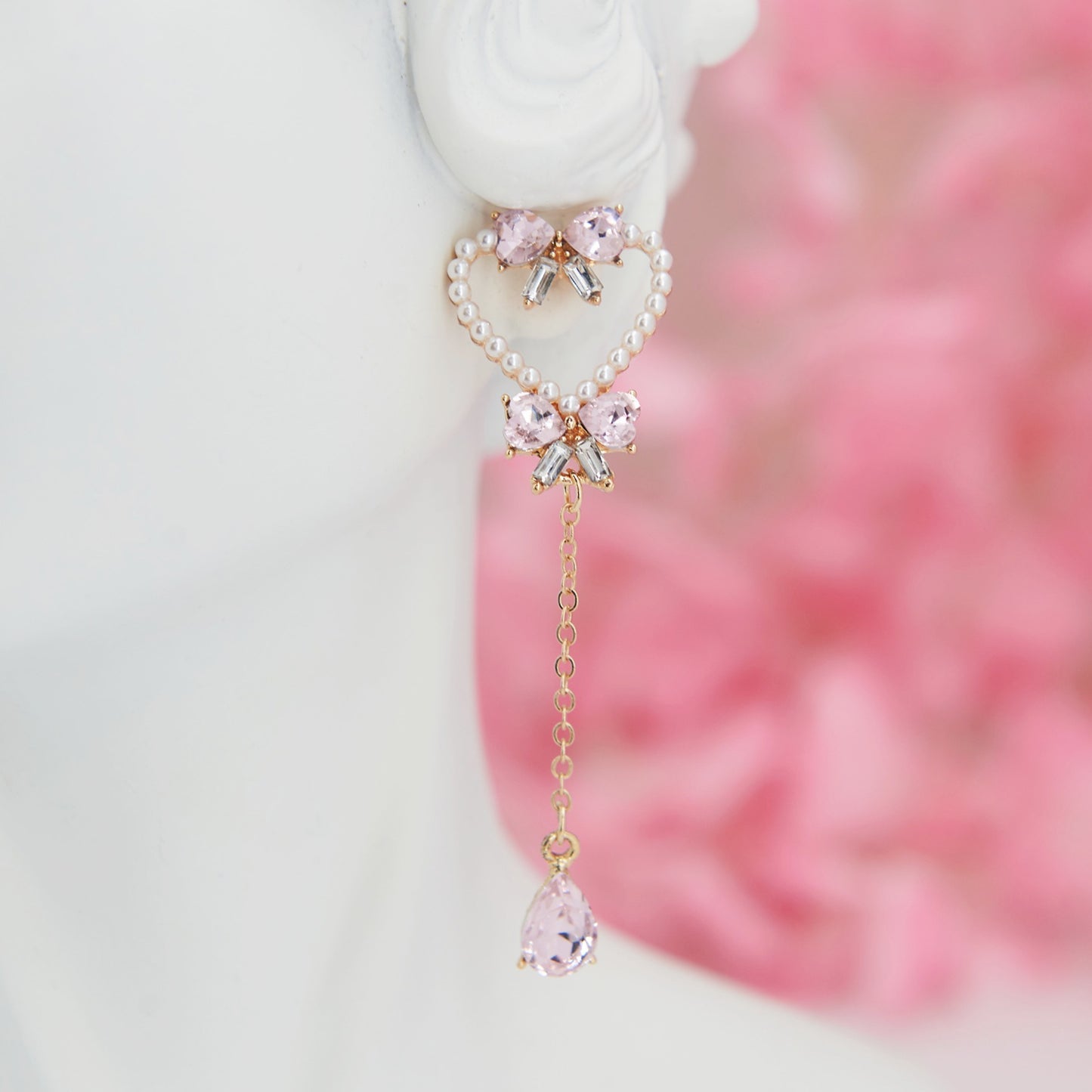 Heart-shaped earrings adorned with pearls and pink zircon teardrops—romantic, feminine, and perfect for a soft coquette look.