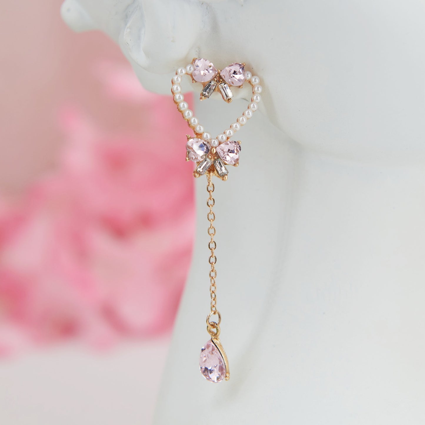 Heart-shaped earrings adorned with pearls and pink zircon teardrops—romantic, feminine, and perfect for a soft coquette look.