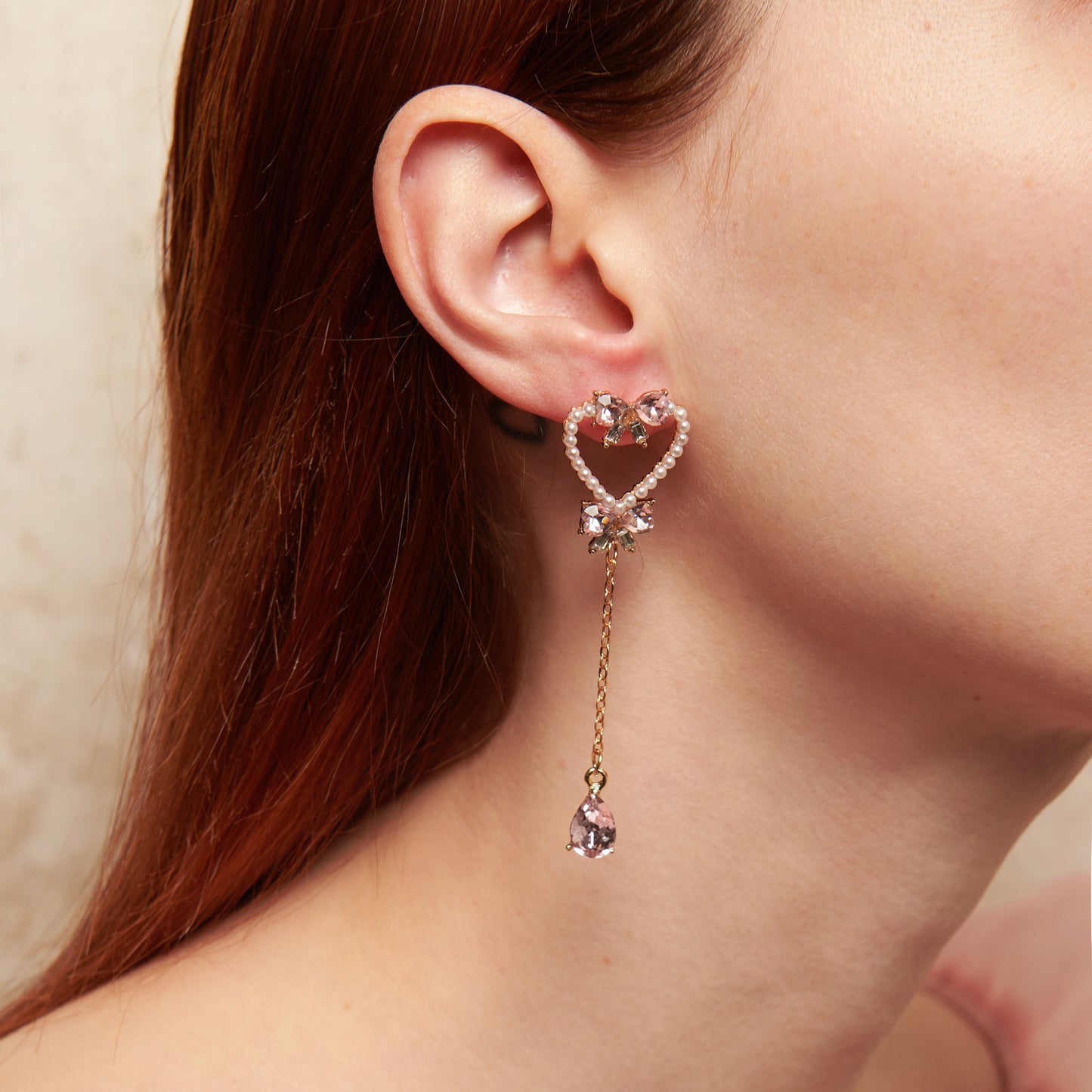 Heart-shaped earrings adorned with pearls and pink zircon teardrops—romantic, feminine, and perfect for a soft coquette look.