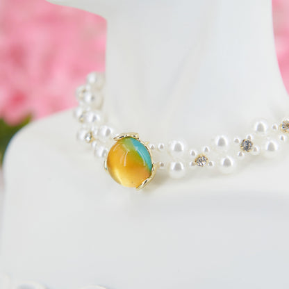 Baroque choker with artificial pearls and yellow pendant