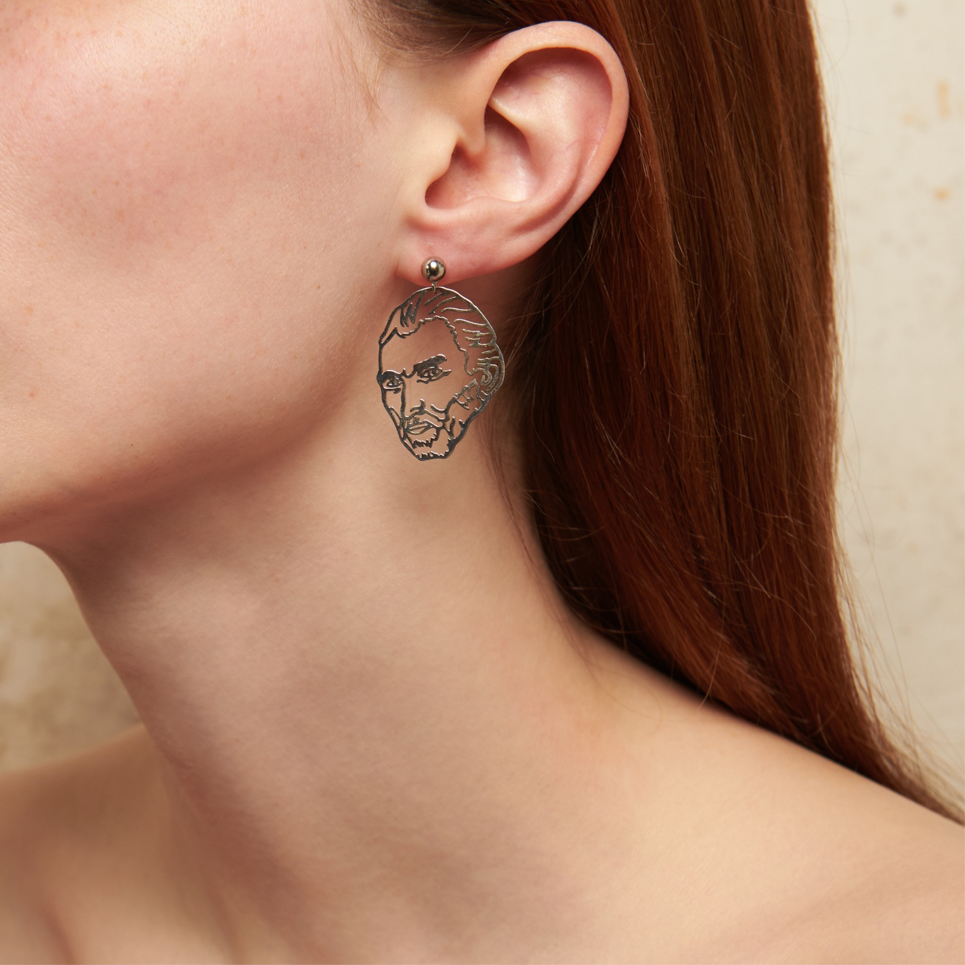 "Van Gogh" earrings, 4 cm. Asymmetrical titanium design: Van Gogh’s face & ear. Artistic, original, and bold—perfect for art lovers.
